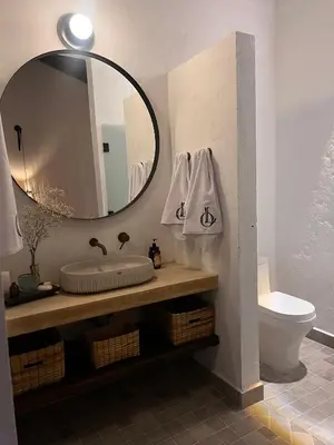 a bathroom with a sink and a mirror at Casa La Oronda - Hotel Boutique- Cauca Viejo in Jericó