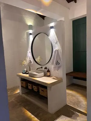 a bathroom with a sink and a mirror at Casa La Oronda - Hotel Boutique- Cauca Viejo in Jericó