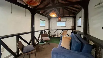 an overhead view of a living room in a tent at Cabaña Blanca Guarne cerca a Metrocable ARVI in Guarne