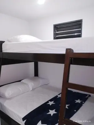 a bunk bed with stars on the bottom bunk at Casa Hévenie, Amplia, familiar, cómoda y bien ubicada in El Poblado