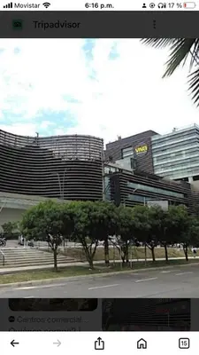 a picture of a building with trees in front of it at 