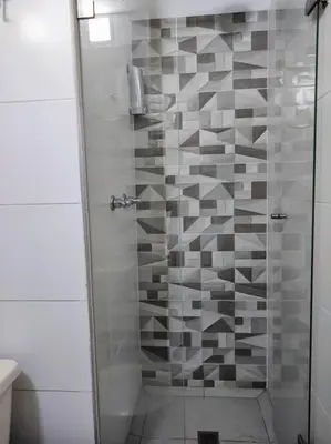 a shower with a glass door in a bathroom at Apto 2 alcobas 2 baños 2 closet 2 camas dobles barrio cabañitas in Bello
