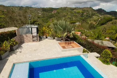 an image of a swimming pool in a villa at Casa de Campo Monblack in El Peñol