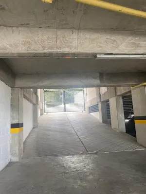 an empty parking garage with a parking lot at CC Fundadores, cerca sector el Cable y CC Mall Plaza in Manizales