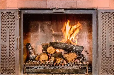 a fire oven with meat and vegetables in it at Country Western State in Marinilla