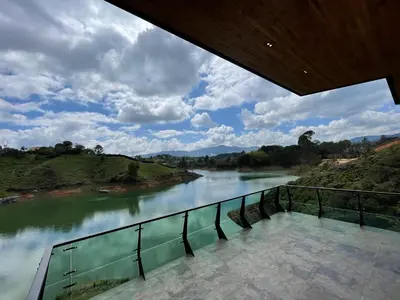 a view of a river from a viewing deck at Finca Villa Glamping in La Pradera