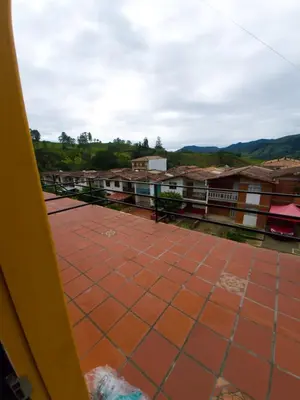 a view of a town from the balcony of a building at Villa Andrea Apartamento de lujo en Jericó Antioquia para 7 personas in Jericó