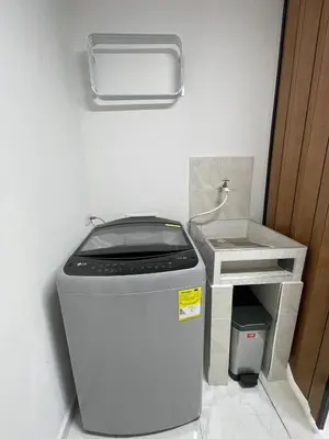 a trash can in the corner of a room at Premium Location Comfort in Medellín