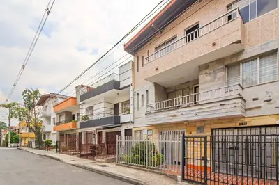 an apartment building with balconies on a street at Studio30 A, Belen, Los Molinos in Medellín