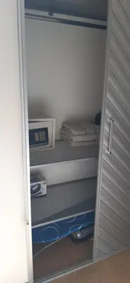 an open door of a refrigerator filled with shelves at Luxury Laureles-LA 70-Medellin Stunner in Medellín