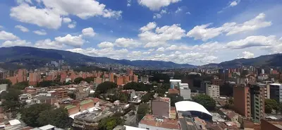 a view of a city with buildings and mountains at Modern, Stylish, Awesome Locacion, Gorgeous Views in Medellín