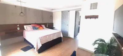 a bedroom with a bed and a basketball hoop at Modern, Stylish, Awesome Locacion, Gorgeous Views in Medellín