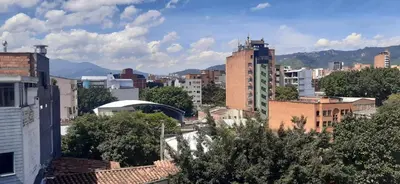 a view of a city with buildings and trees at Cold AC-fast Wi-Fi-great location-Medellin fun in Medellín