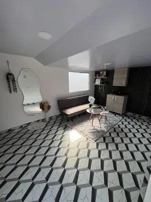 a living room with a couch and a table at Apartamento en Itagüí in Itagüí