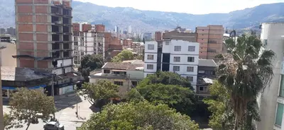 a view of a city with buildings and trees at New comfortable Laureles Apartment Great location! in Medellín