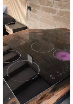 a stove top with purple dye on top of it at Espectacular Cabaña en Rionegro Antioquia, vista paisajes in Rionegro