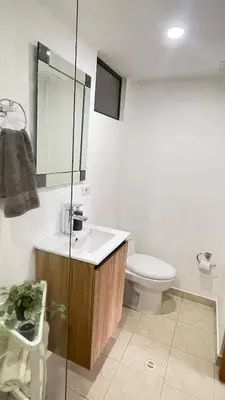 a bathroom with a sink and a toilet at Aparta estudio muy bien ubicado in Medellín
