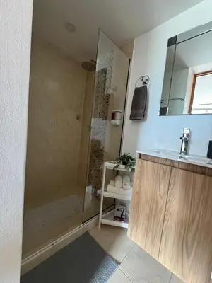 a bathroom with a shower and a sink at Aparta estudio muy bien ubicado in Medellín