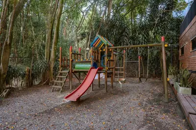 a park with a playground with a slide at Cómodo y recién remodelado apto de 2 habitaciones cerca a Provenza in Medellín