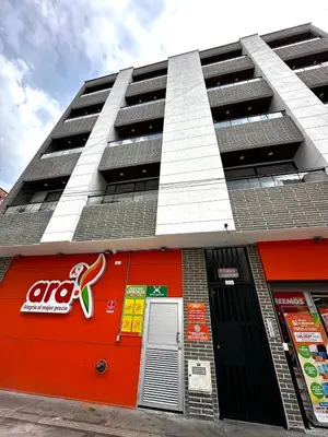 a building with solar panels on the side of it at Espectacular apartamento en Itagui in Itagüí