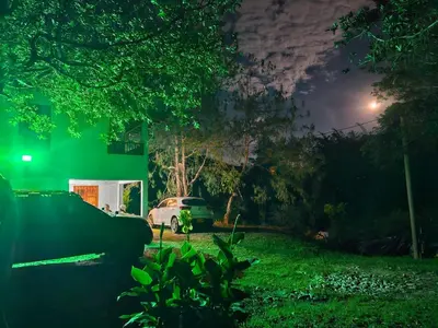 a car parked in a yard at night at Don tranquilo in Concepción