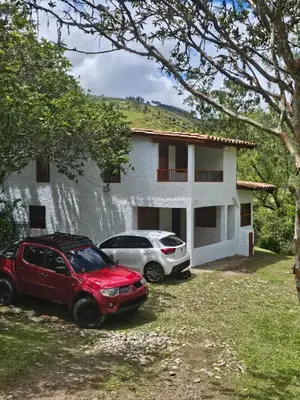 two cars parked in front of a house at Don tranquilo in Concepción