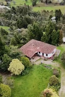 an overhead view of a house with a roof at HOSTAL - COLIVING - Cerca MetroCable ARVI in Guarne