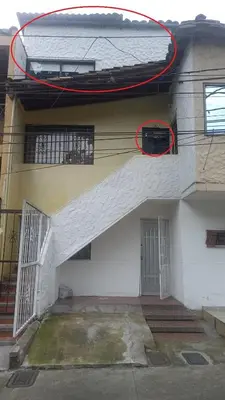 a building with a basketball hoop on the side of it at Apartamento Medellin Cordova in Medellín