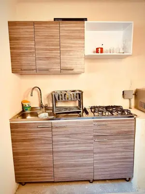 a kitchen with a sink and a stove at The best of Envigado, close to everything in Envigado