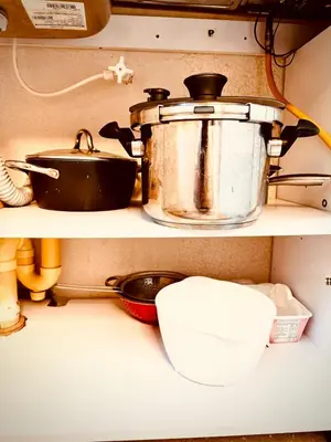a pot and a pan on a shelf in a kitchen at The best of Envigado, close to everything in Envigado