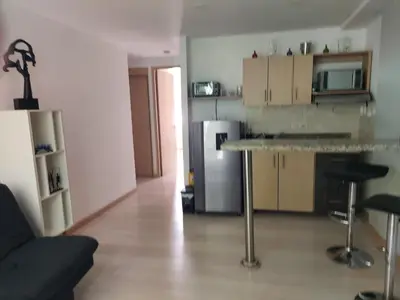 a kitchen with a counter and a refrigerator at Medellin, Bring your toothbrush, in Laureles in Medellín
