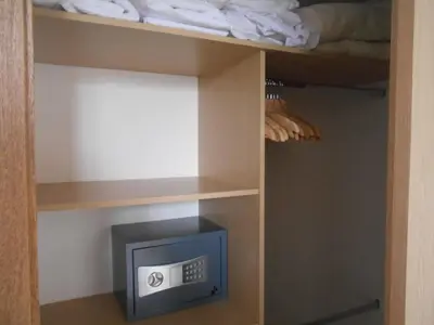 a room with a bunk bed with a safe at Best apartment, best location, Laureles Paradise in Medellín