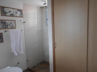 a bathroom with a shower stall and a toilet at Best apartment, best location, Laureles Paradise in Medellín