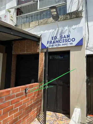 a building with a sign that reads ie san francisco at Digital nomads, everything close Ac Wi-fi fast in Medellín