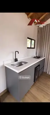 a kitchen with a sink and a counter top at Chalet los naranjos in La Pradera