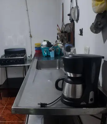 a coffee maker sitting on top of a kitchen counter at Mirador del Río in Honda