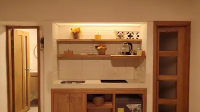 a kitchen with a sink in a room at Acogedor mini apartamento in Sonsón