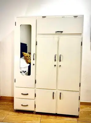 a large white locker room with a mirror at AC Laureles Fast Internet for Nomads 5 Floor in Medellín
