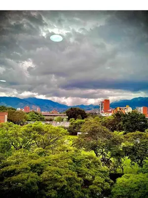 a frisbee flying in the sky over a city at Ac Corner, at nice 5 floor fast wifi in Medellín