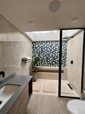 a bathroom with a tub and a sink at Glamping La Nonita tipo cabaña Luxury in Manizales