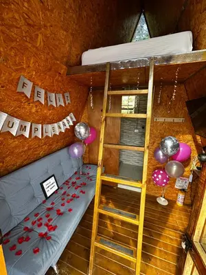 an overhead view of a room with a bunk bed and balloons at Chalet Guadalupe - Girardota