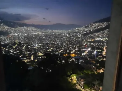 a view of a city at night at Medellin Las Palmas Beautiful View in Medellín