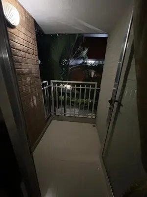 a stairway leading to a balcony in a building at Apartment in Bello in Medellín