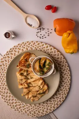 a plate with a piece of food on a table at Ivanna Hotel Campestre - Santa Fe de Antioquia in Santa Fe de Antioquia