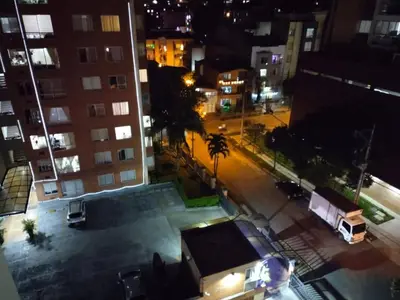 a view of a city street at night at Apartaestudio Ofisuite-Medellin in Medellín