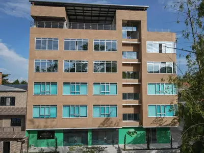 an exterior view of a building at Hotel La Esmeralda Doradal in Doradal