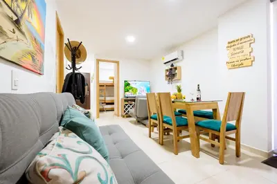 a living room with a couch and a table at Apartamento San Jerónimo - Antioquia in San Jerónimo