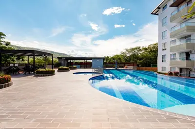 a swimming pool on the side of a building at Apartamento San Jerónimo - Antioquia in San Jerónimo