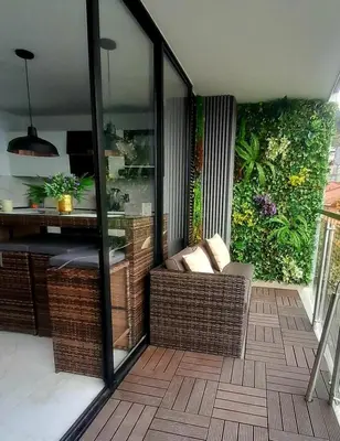 a screened in porch with a chair on a patio at Espectacular apartamento completamente dotado en Yarumal Antioquia! in Estación El Salto