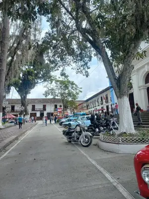a group of motorcycles parked on the side of a street at Alojamiento Betina in Salamina